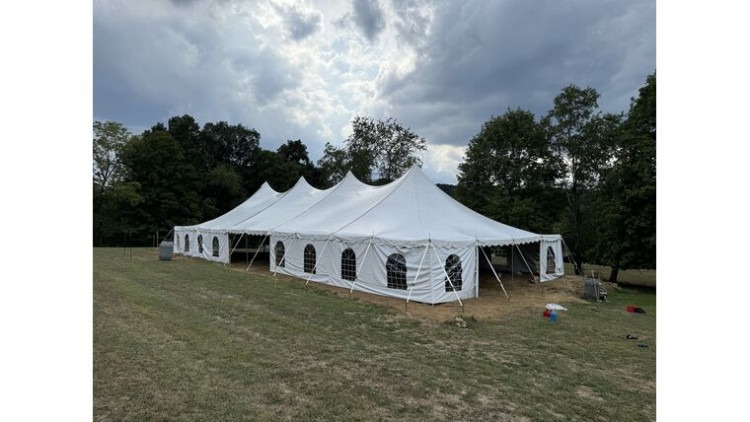 Large white event tent setup for outdoor party or community event in Cranberry Township PA