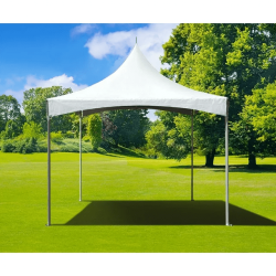 White frame tent installed on a grassy outdoor venue for event seating and guest gatherings